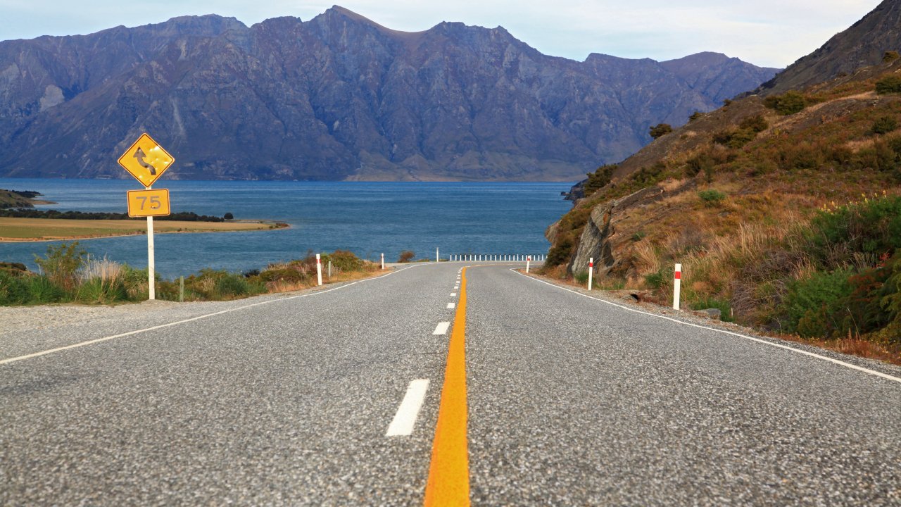 perspective of highway road freeway to lake Hawea in Wanaka New Zealand